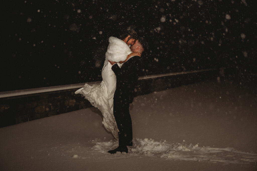 Bride and groom portrait at Tyde at Walnut Beach in Milford CT during blizzard winter wedding