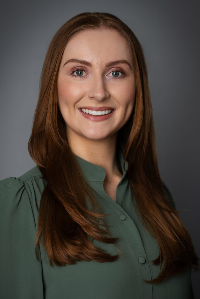 A natural and approachable professional headshot of Caroline, emphasizing a variety of expressions for a versatile professional gallery.