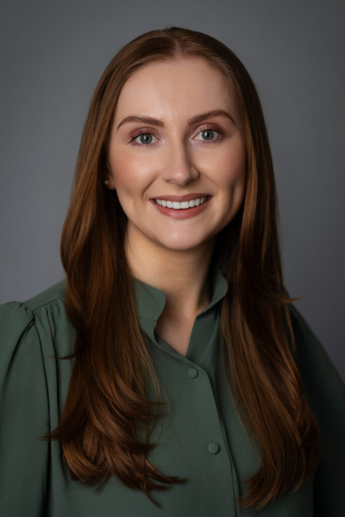 Caroline displaying a warm confidence in a portrait designed for use on company websites and press features.