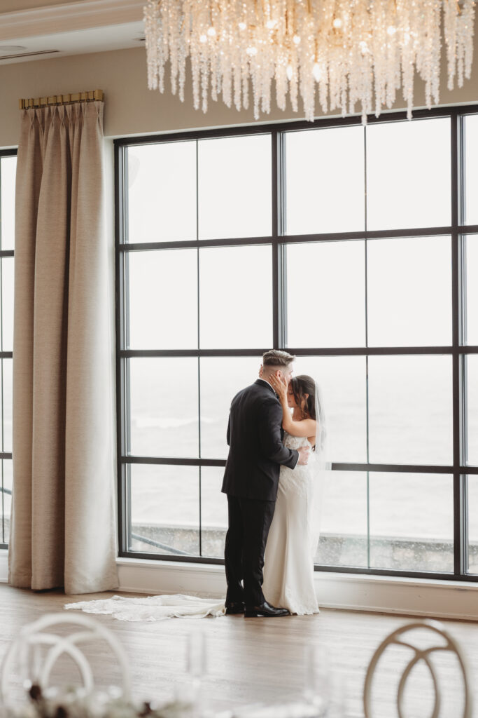 Bride and groom portrait inside Tyde at Walnut Beach during winter wedding reception